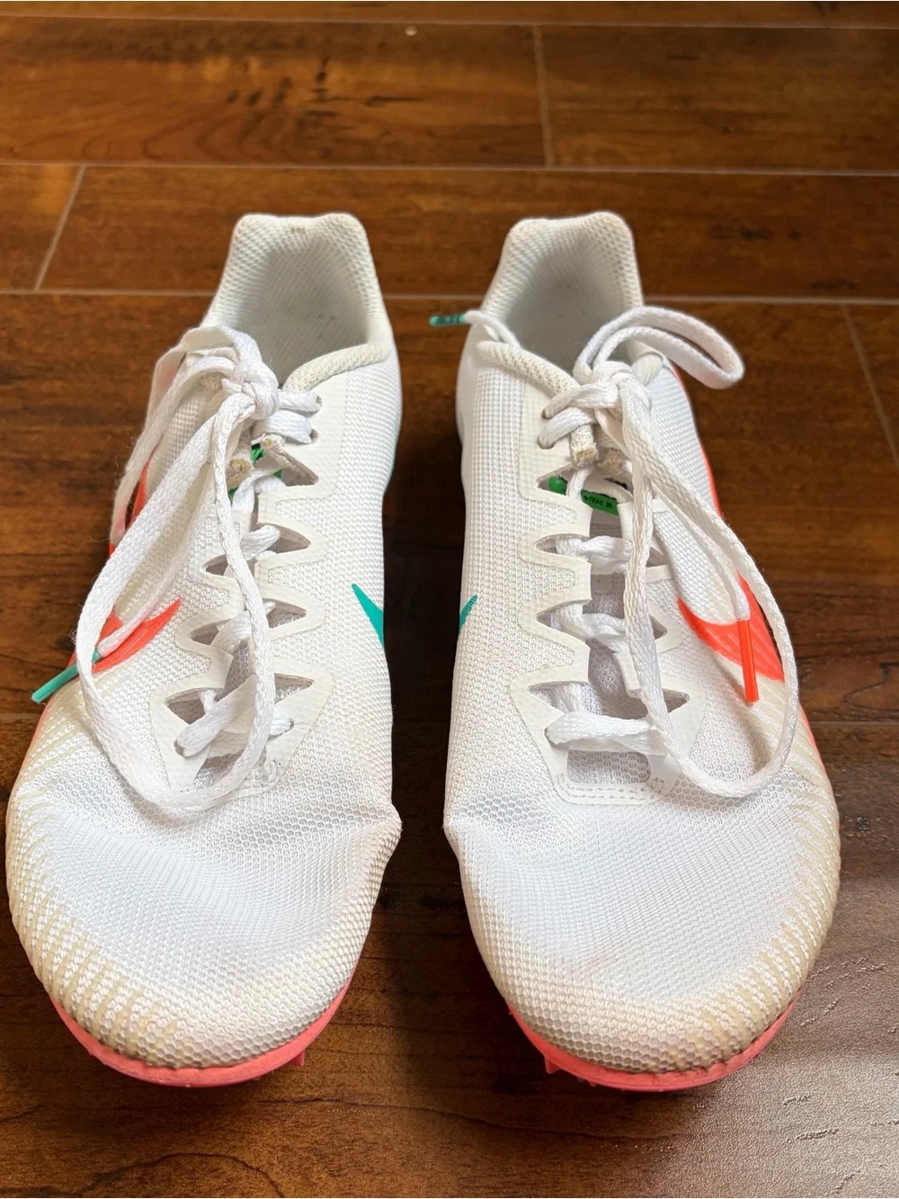 Nike Women’s White Track Spikes with Coral & Teal Accents